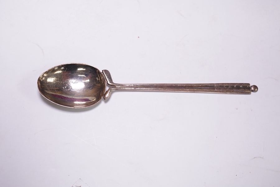 A cased Edwardian silver Christening trio, by Henry Wigful, Sheffield, 1909 and a cased set of eleven Edwardian silver coffee spoons and pair of sugar tongs, London, 1901/2 and one odd silver golf related teaspoon. Condi